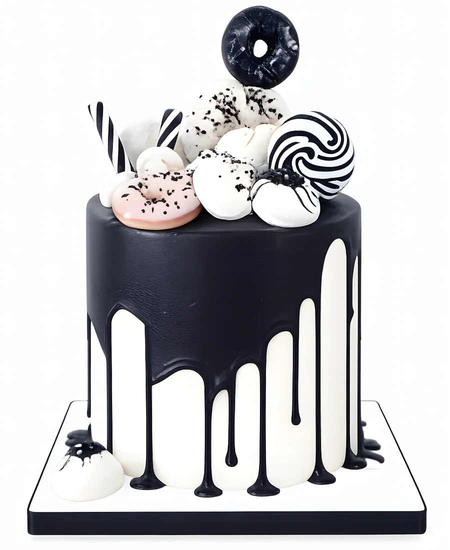 Черно-белый торт со сладостями для девочки Фото