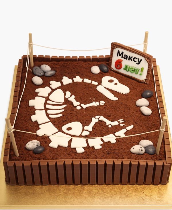 Торт в виде раскопок костей динозавра Юрского периода Фото