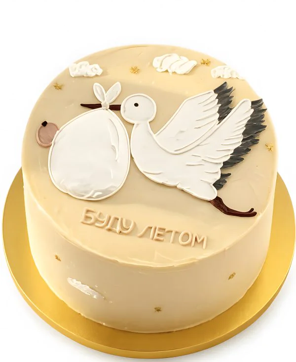 Нежно коричневый торт с аистом Фото