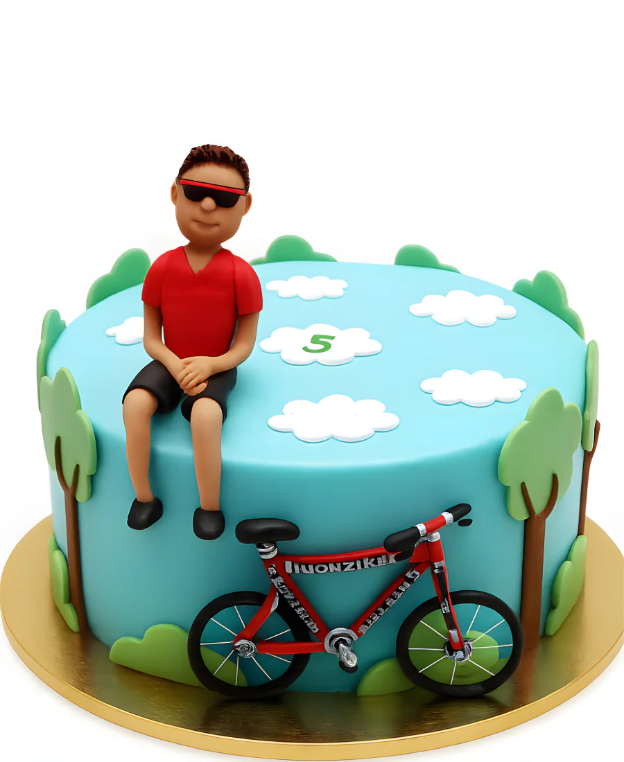 Торт с фигуркой велосипедиста Фото