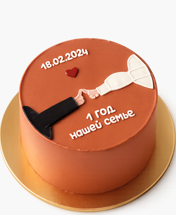 Оранжевый бенто-торт с руками супругов Фото