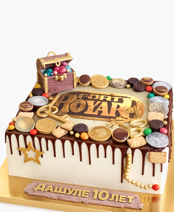 Прямоугольный торт с монетами и ключом Фото