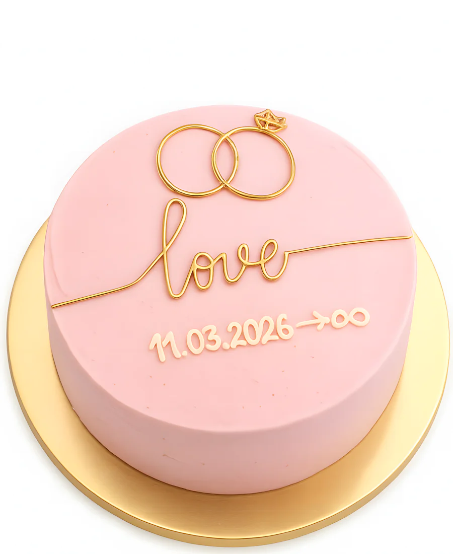 Розовый бенто-торт с рисунком колец Фото