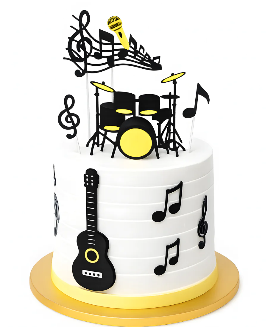 Торт с барабанами, гитарой и нотами Фото