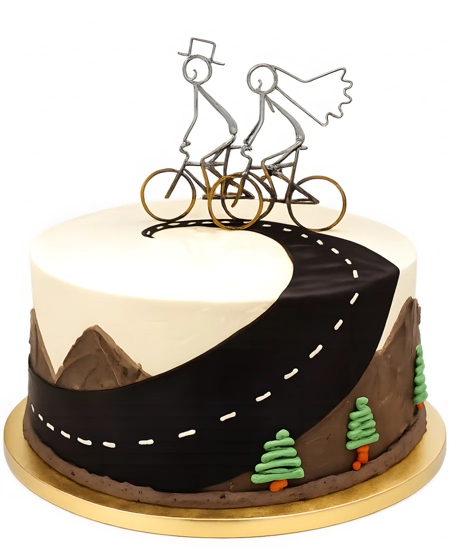 Нежный торт с парой велосипедистов Фото