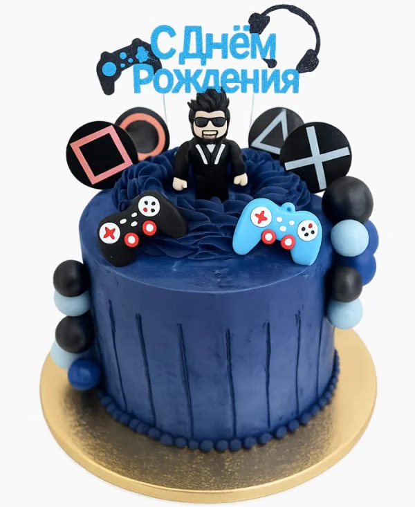 Синий торт с мастичным топпером геймера Фото
