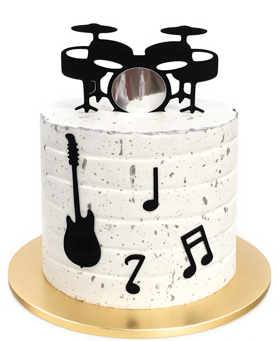 Торт с нотами, барабанами и гитарой для музыканта Фото