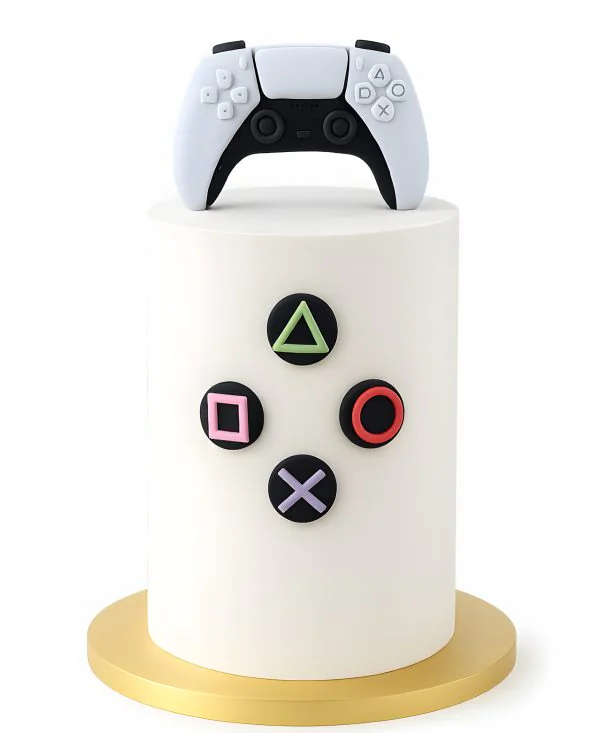 Высокий торт с белым джойстиком Фото