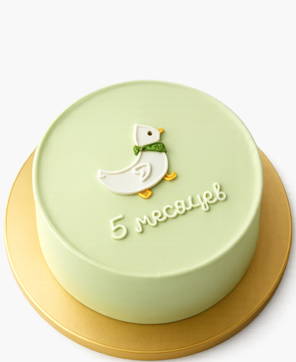 Зеленый бенто-торт с гусем Фото