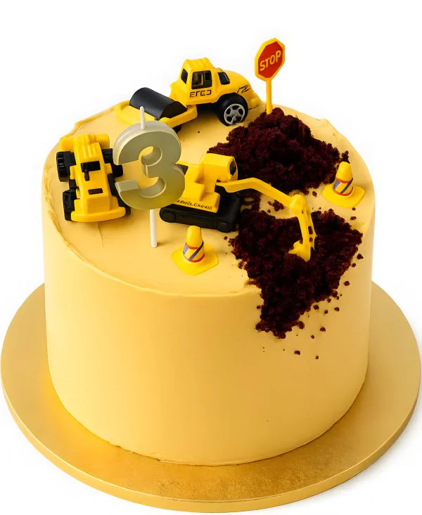 Желтый торт с фигурками экскаваторов Фото