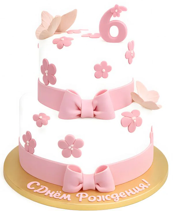 Двухъярусный белый торт с розовыми бантами и бабочками Фото